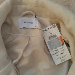 Reserved L palton damă bej crem haină lungă