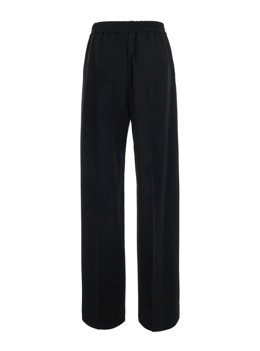 Pantaloni Black Pants with Elastic Waist. They feature a relaxed silhouette and side pockets. In Tech Fabric. Black. Women. - Img 2