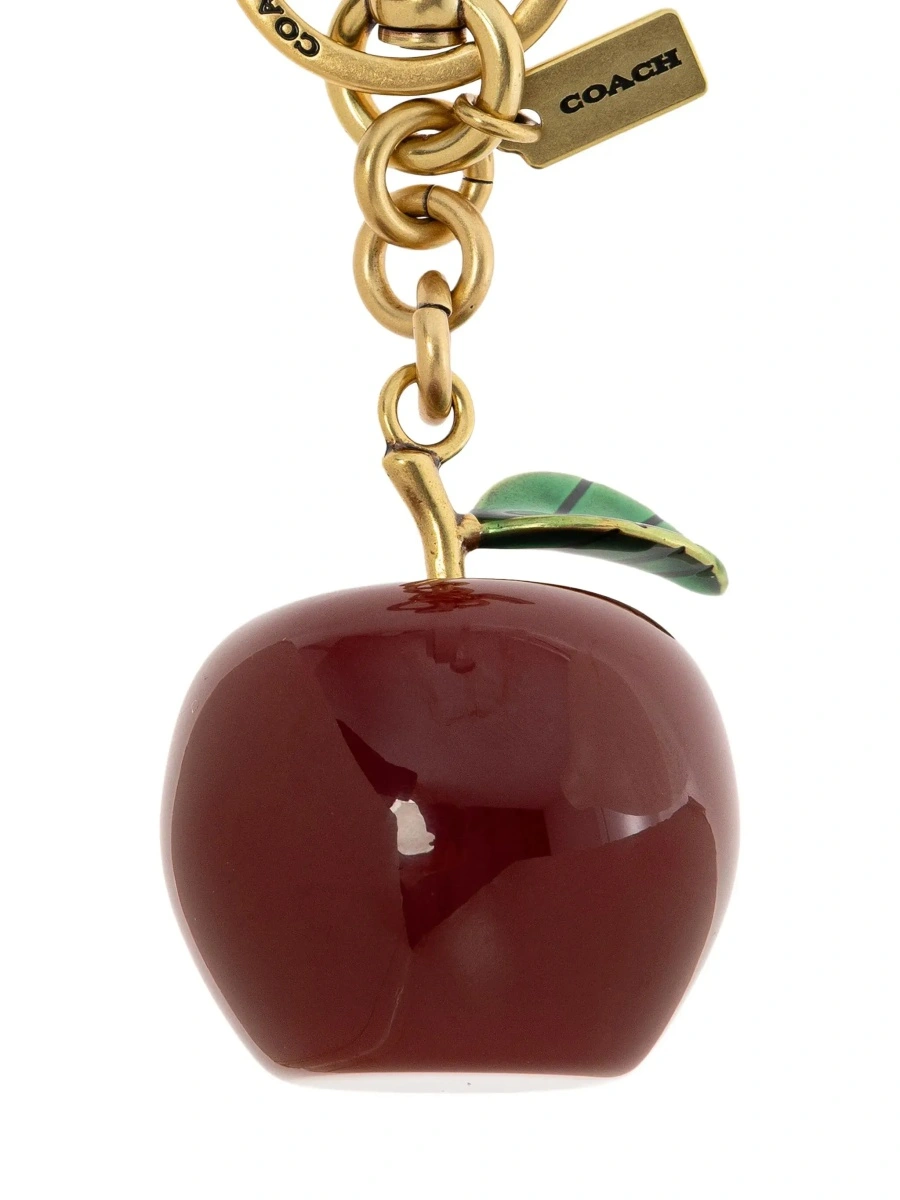 Brelocuri gold and red Keychain with apple shape and embossed logo in metal for women - Img 4
