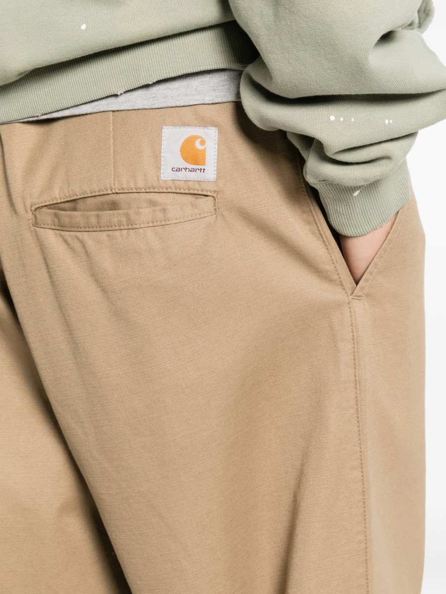 Pantaloni evazati Carhartt neutri din bumbac - Img 5