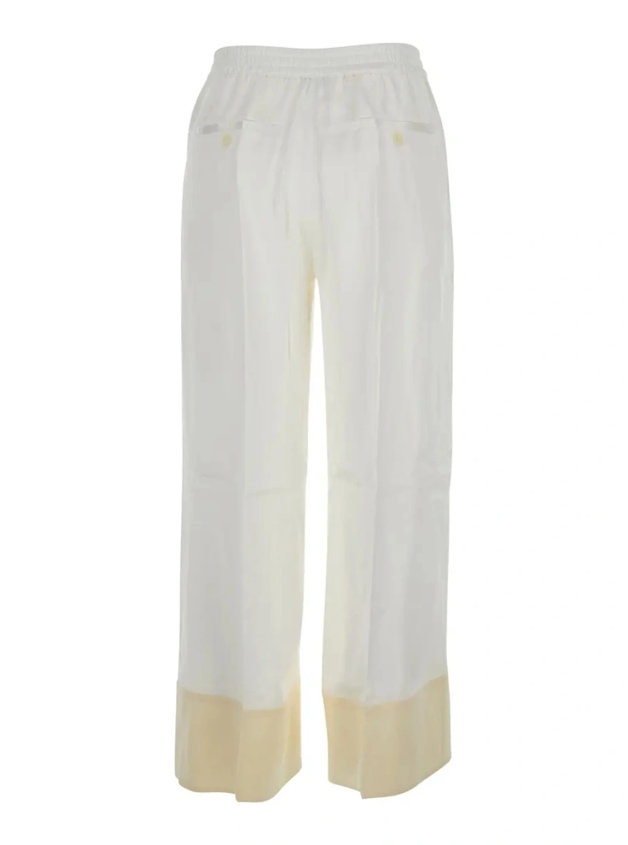 Pantaloni TOTEME albi din matase - Img 2