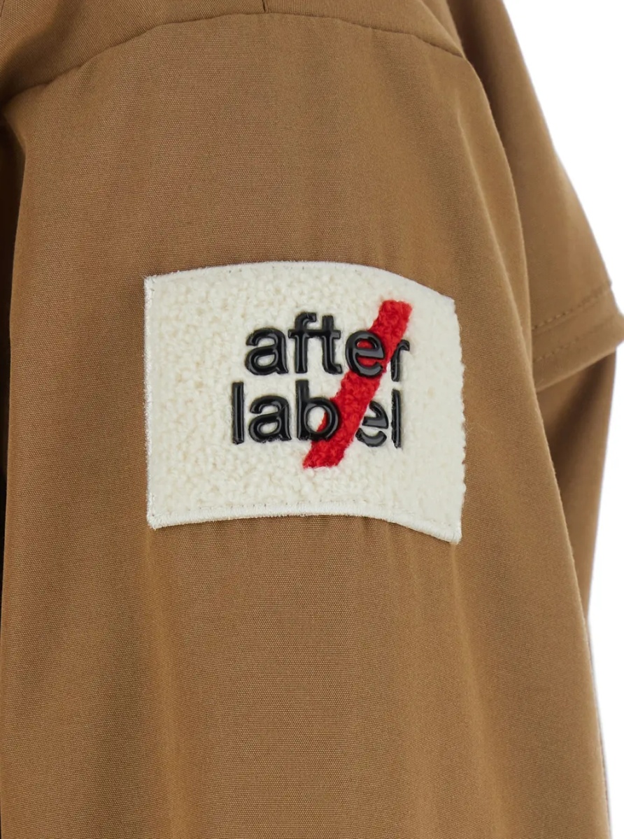 Geci USHUAIA SHORT PARKA with collar, long sleeves and front closure. Tech Fabric, beige color, unisex - Img 3