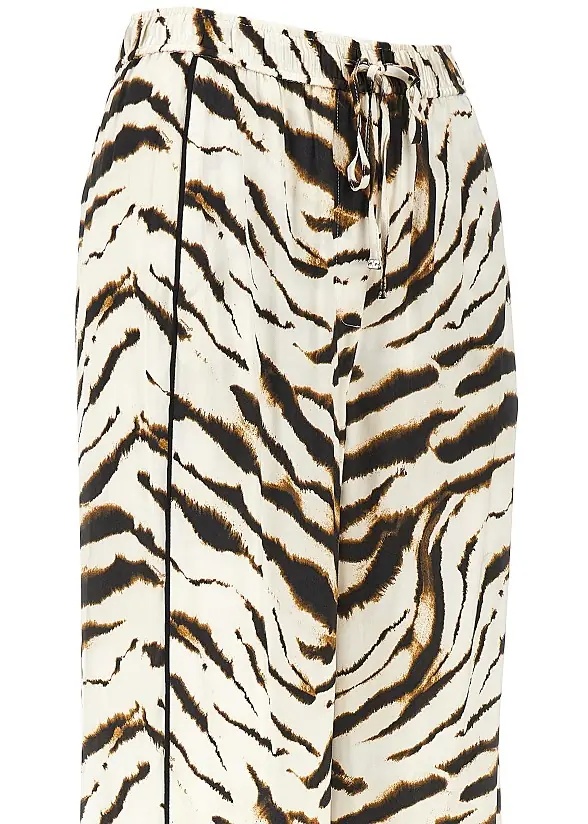 Pantaloni Satin pants with zebra-striped print - Img 2
