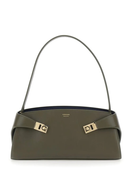 Curea 'Hug East West' Green Shoulder bag with shoulder strap and buckled belts on the front in leather for women