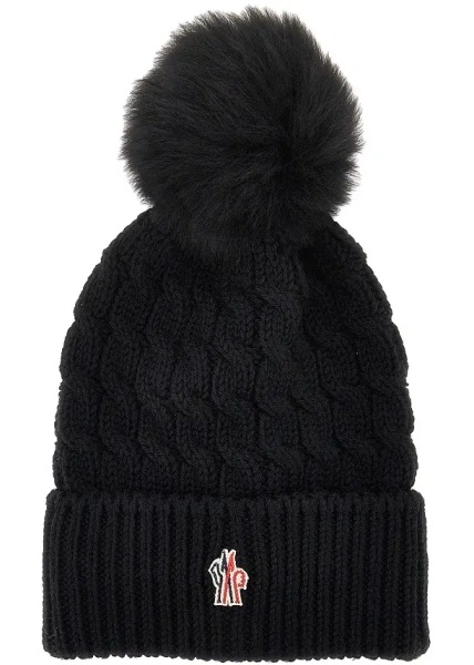 Manusi Wool beanie hat with fur pompom