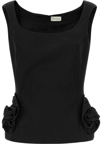 Top with floral appliqués