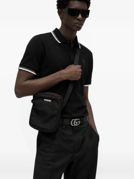 Geanta tip postas Gucci neagra din material textil