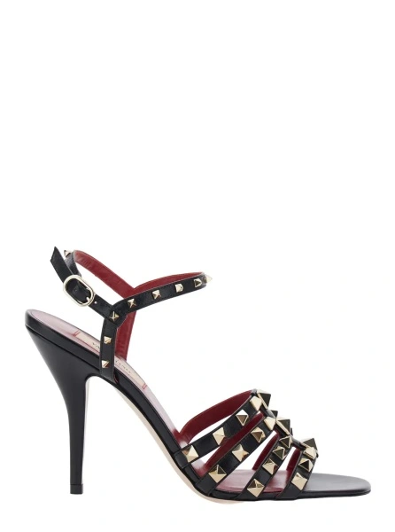 Sandale Black Heeled sandals with Rockstud embellishment and high heel in leather for women