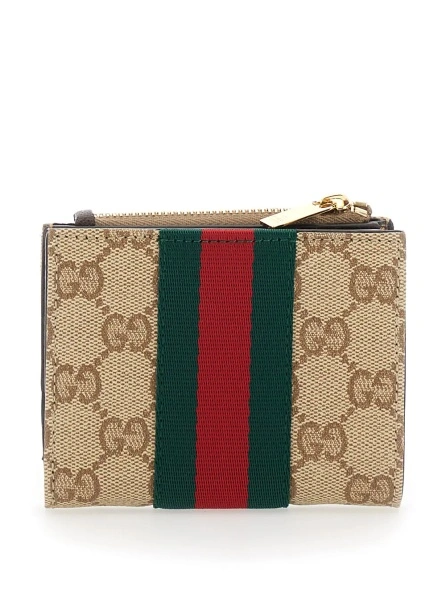 Portofel Gucci bej din canvas GG