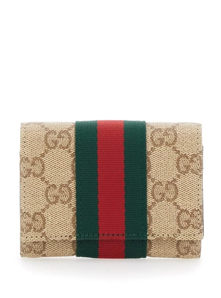 Portofel Gucci bej din material textil