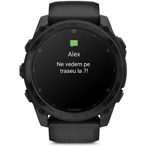 Ceas smartwatch GPS tactic Garmin tactix 8 Standard AMOLED 51mm cu ramă din titan și lanternă verde.