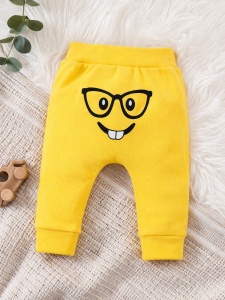 Pantaloni bebe galbeni bumbac imprimeu fata zambet confortabili - Img 1