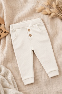 Pantaloni bebe crem striati din bumbac cu buzunare si nasturi decorativi