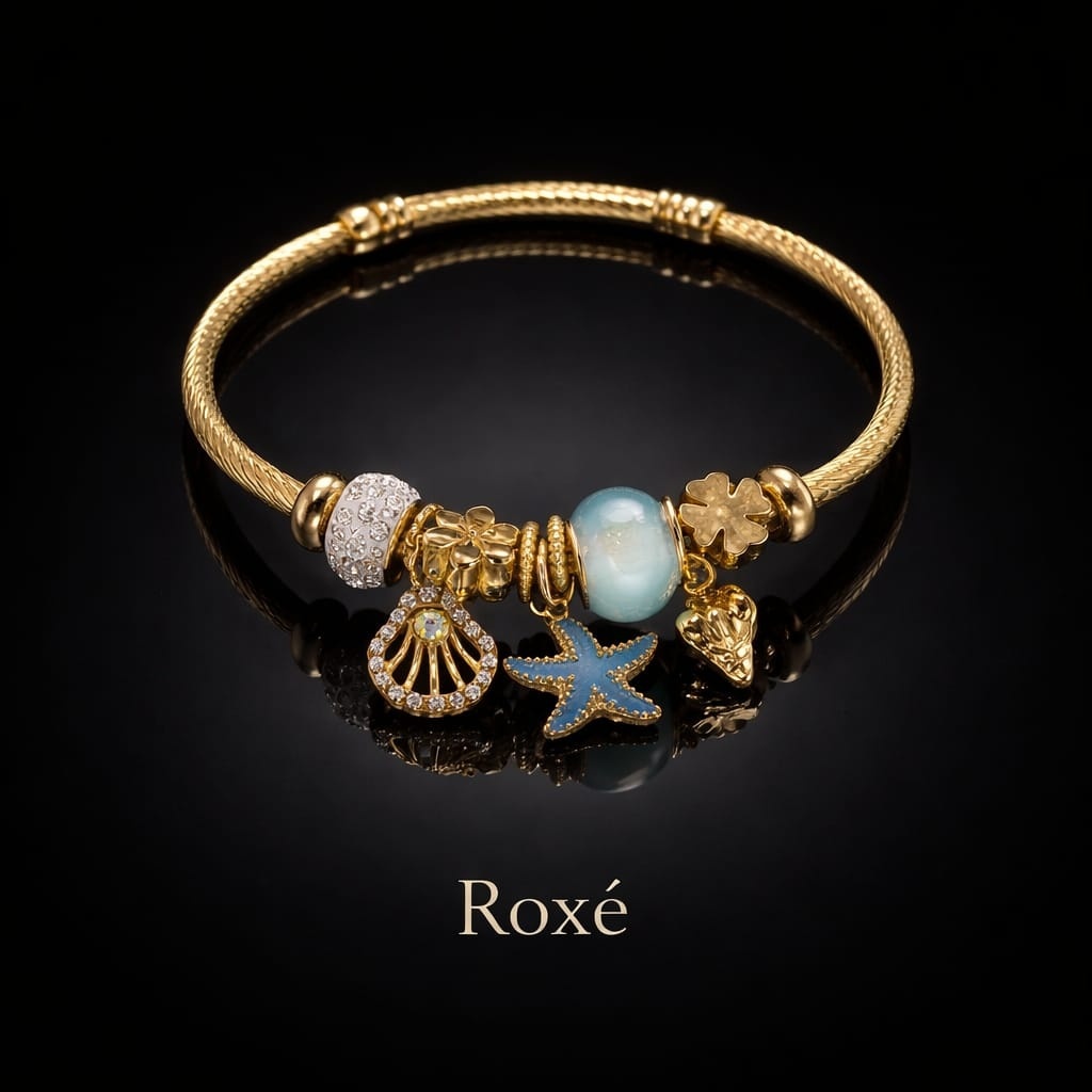 Bratara dama ROXE aurie cu charmuri marine stea de mare si scoica, eleganta 3