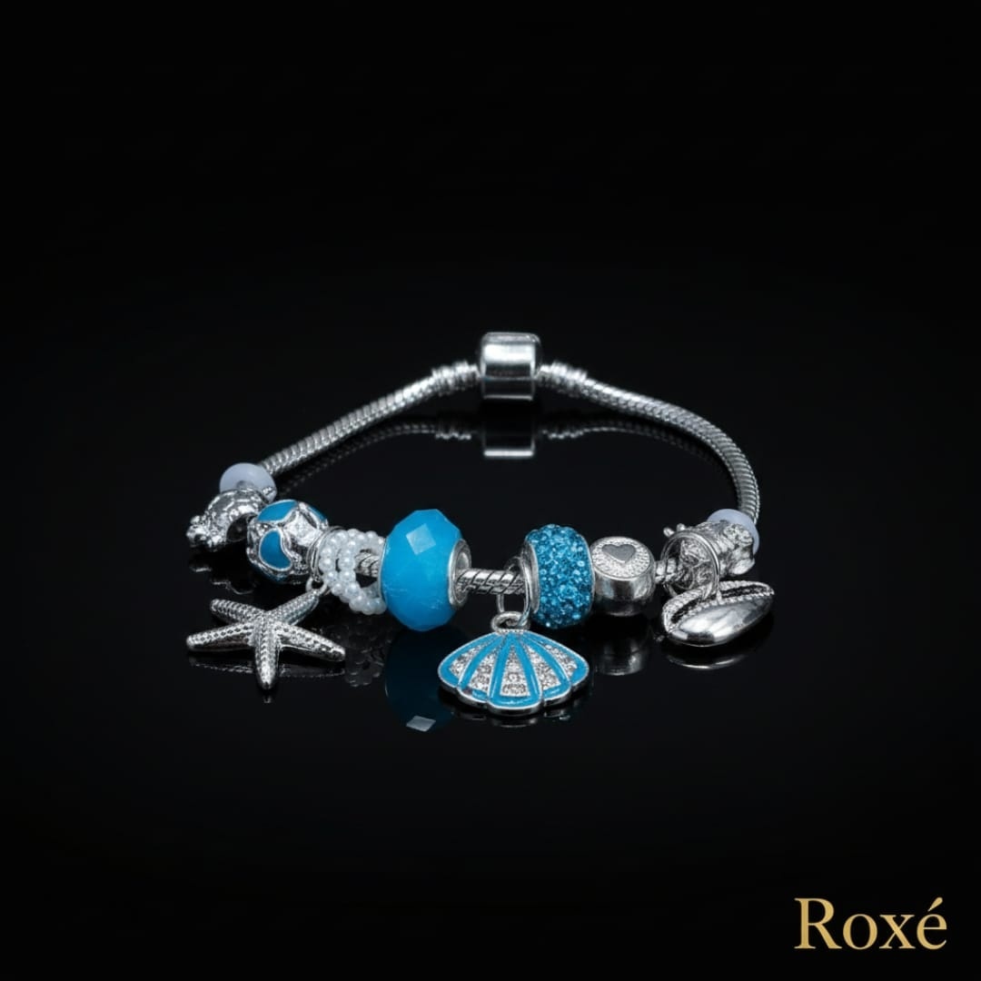 Bratara dama ROXE argintie cu charmuri marine si pandantive elegante, model chic 4