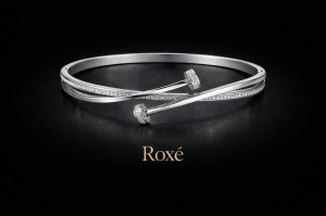 Bratara ROXE argintie eleganta cu design incrucisat si cristale inchizatoare fixa