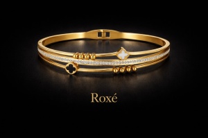 Bratara ROXE aurie cu trifoi alb si negru si cristale design elegant inchizatoare fixa