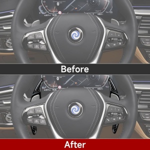 Padele volan carbon negru instalate pe volan BMW