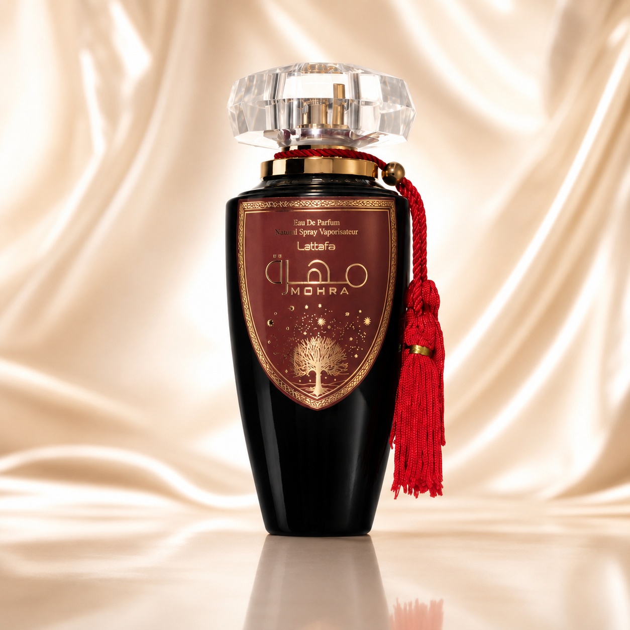 Flacon Lattafa Mohra 100 ml parfum unisex negru lucios cu etichetă bordo, capac cristalin și ciucure roșu