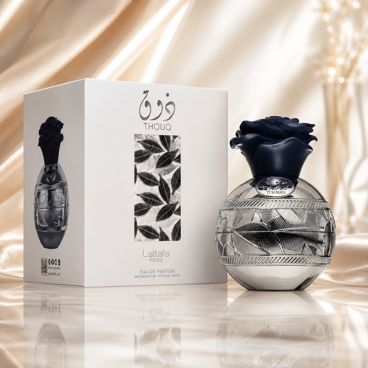 Parfum Arăbesc Thouq Lattafa Pride EDP 80 ml Unisex cu flacon argintiu gravat, capac bleumarin &icirc;n formă de trandafir și cutie albă premium