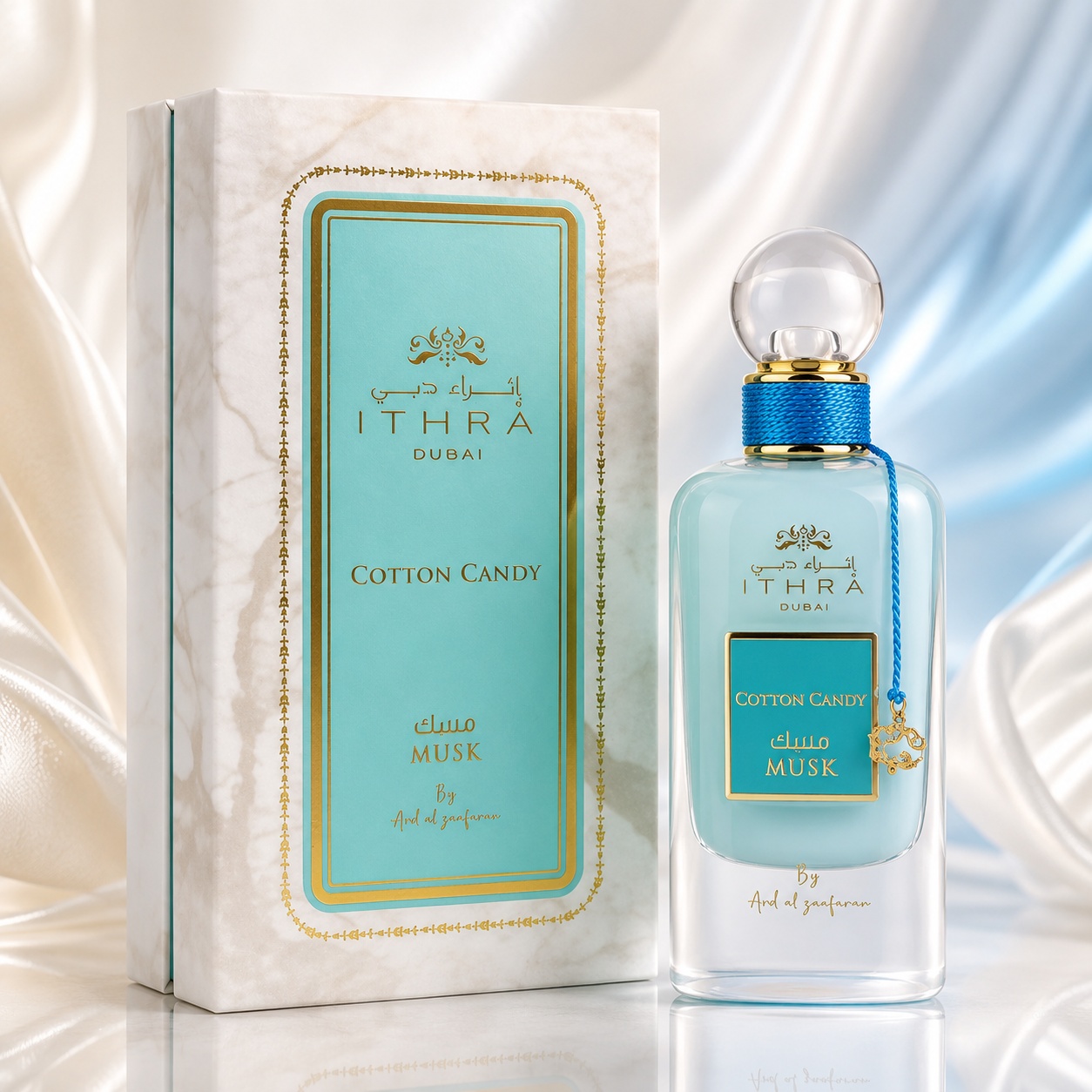 Parfum Arăbesc Ithra Dubai Musk Cotton Candy Ard Al Zaafaran 100 ml cu flacon bleu turcoaz, capac glob transparent și cutie crem turcoaz premium