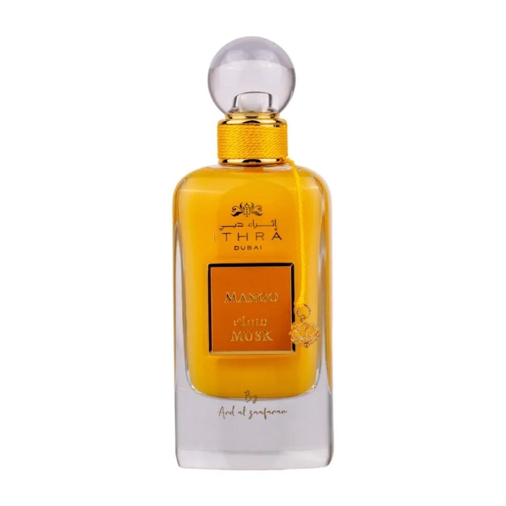 Flacon Ithra Mango Musk Ard Al Zaafaran 100 ml parfum arăbesc cu lichid mango, capac sferic și detalii aurii