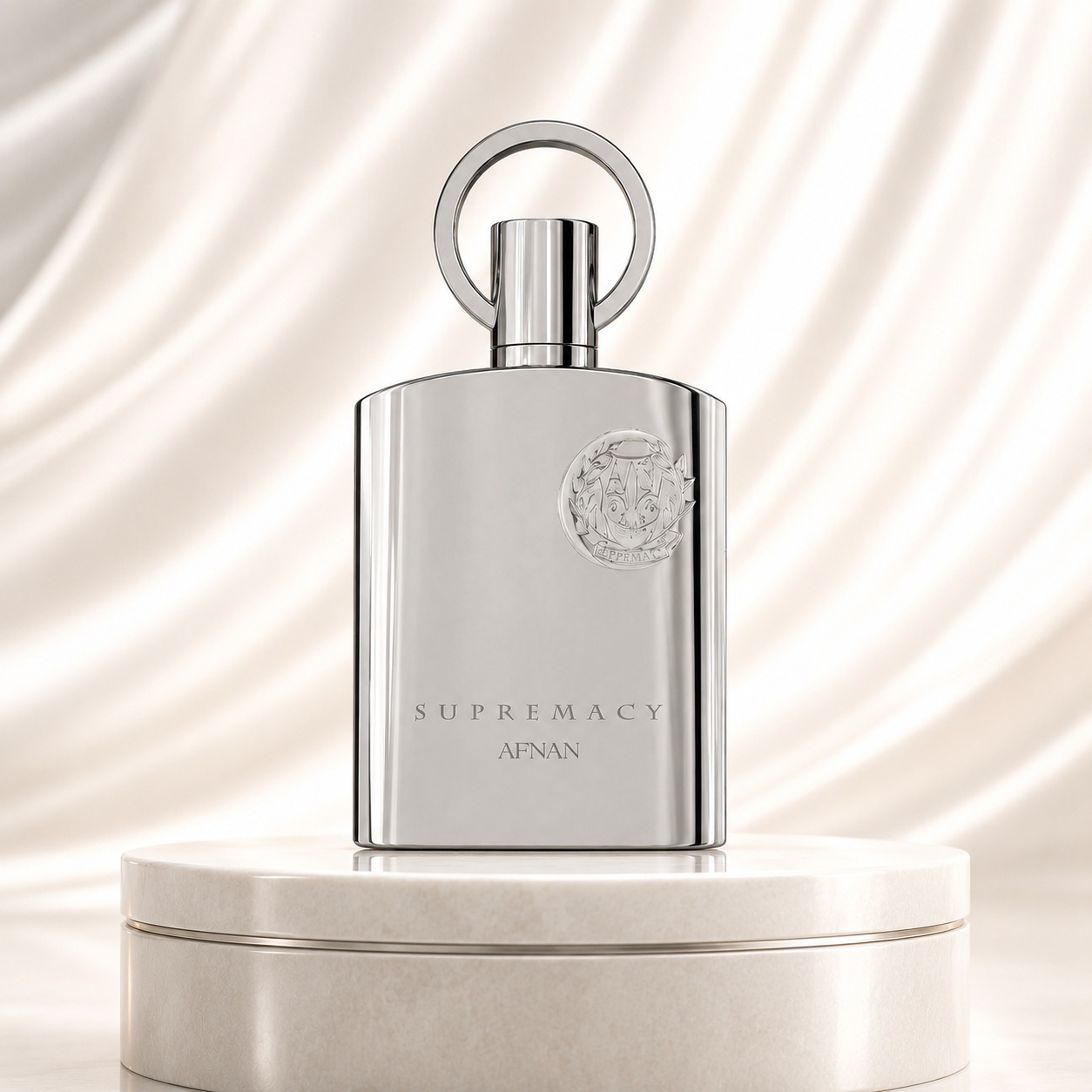 Sticlă parfum Afnan Supremacy Silver 100 ml cu flacon argintiu lucios și capac circular distinctiv
