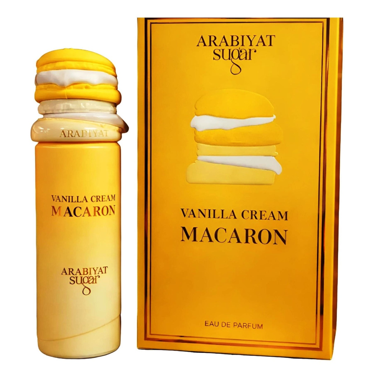 Arabiyat Sugar Vanilla Cream Macaron, prezentare pe fundal alb cu sticlă și cutie galbenă gourmand