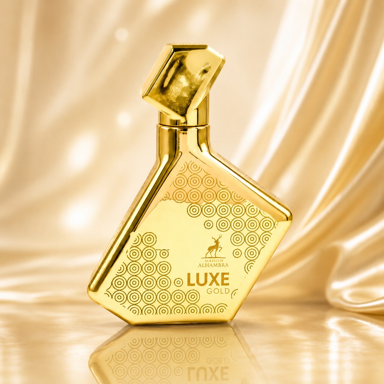 Sticlă Parfum Alhambra Luxe Gold Maison Alhambra 100 ml pe fundal auriu luminos premium