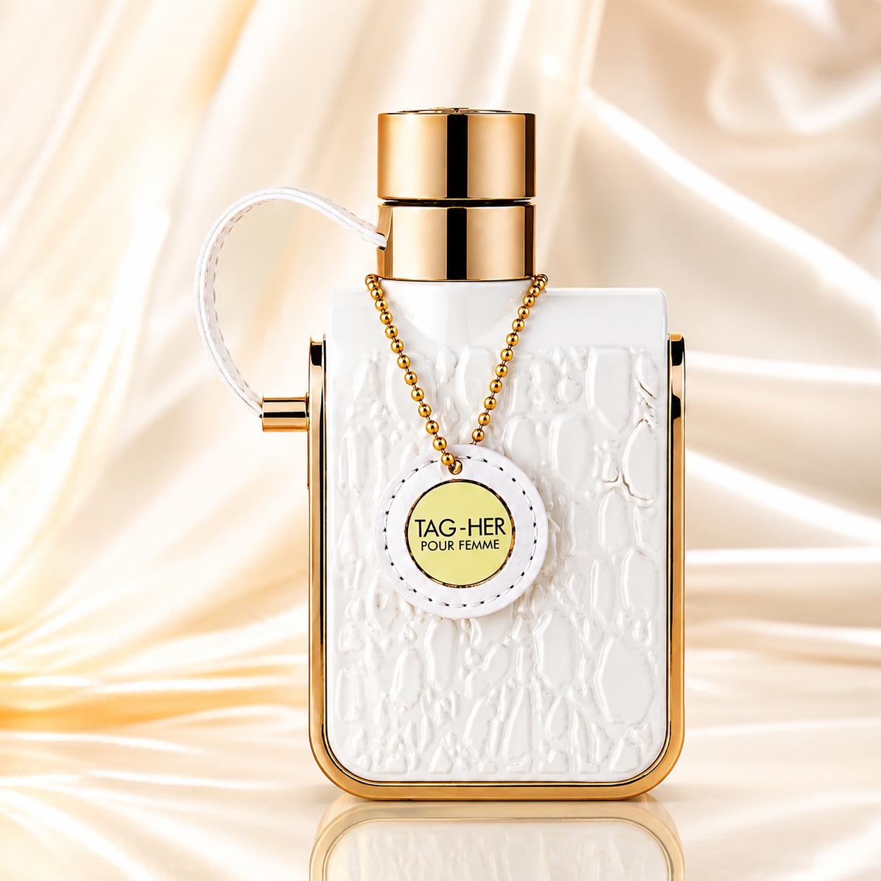 Flacon Armaf Tag Her 100 ml alb cu textură embosată, accente aurii și pandantiv decorativ