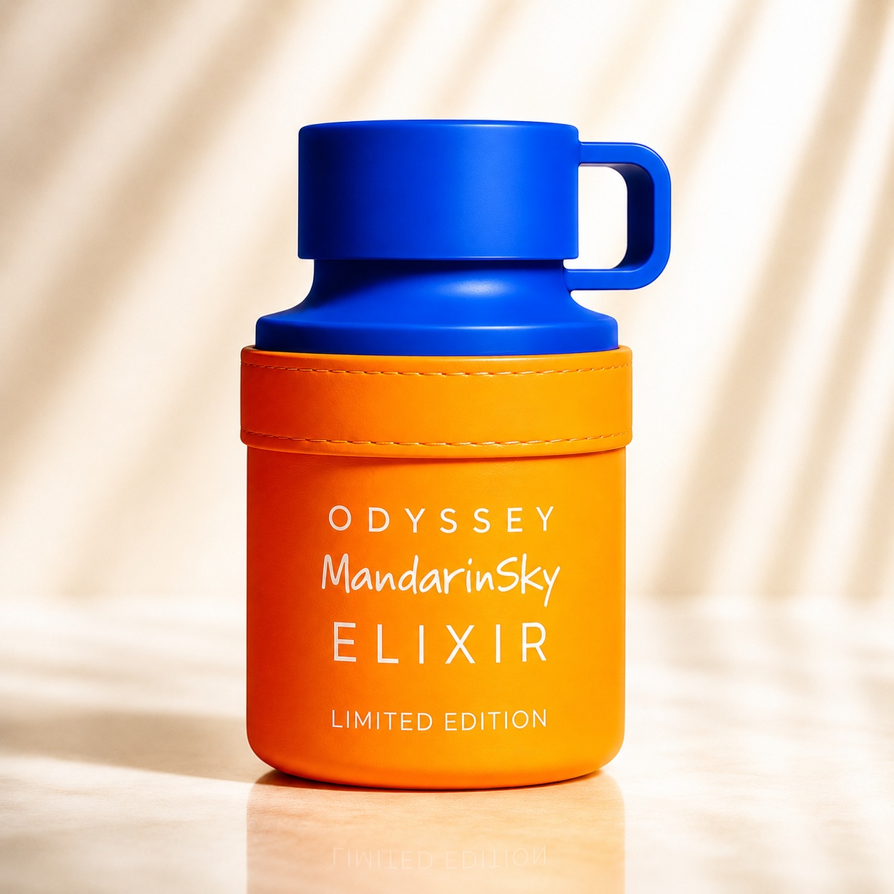 Flacon Armaf Odyssey Mandarin Sky Elixir 100 ml portocaliu cu capac albastru și design modern