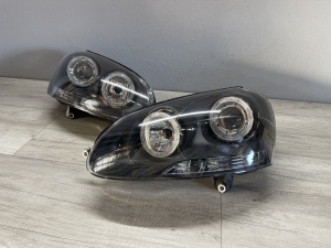 Faruri VW Golf 5 Jetta Angel Eyes look negru cu lupa - Img 2