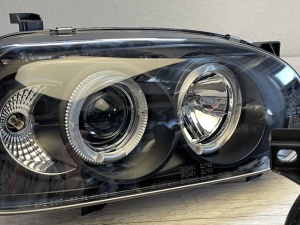 Faruri VW Golf 3 Angel Eyes look negru cu lupa - Img 3