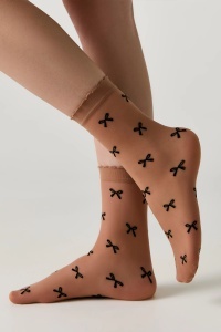 Șosete poliamidă 1-2 cu model fundițe Conte Fantasy 25C-178CP Natural lateral