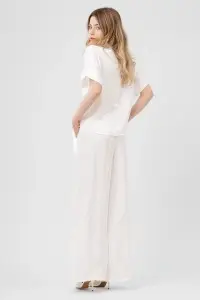 Compleu alb cu top înnodat și pantaloni largi - Img 3