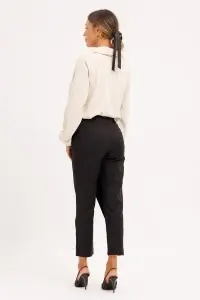 Pantaloni negri conici cu peplum și nasturi decorativi - Img 5