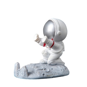 Suport creativ pentru telefonul mobil, pentru birou, model astronaut, tematica primul om pe luna, argintiu