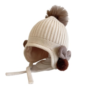 Caciula pentru copii, model cu pom pom si prindere reglabila sub barbie, accesorizata cu iepurasi la urechi, tematica little bunny in the winter, 1 – 3 ani, bej