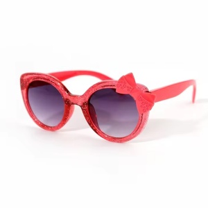 Ochelari de soare pentru fetite, model cu rama semitransparenta accesorizata cu fundita chic, tematica glitter summer, marime universala, rosii