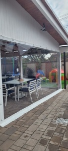 Folie PVC transparentă Cristal Flex® 500 rezistentă UV pentru închideri terase și foișoare