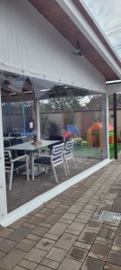 Folie PVC transparentă Cristal Flex® 500 rezistentă UV pentru închideri terase și foișoare