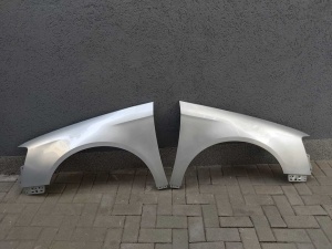 Aripa Fata Dreapta + Stanga VW Passat B6 2005-2011 Vopsita Gri Deschis - Disponibil în rate - Img 1