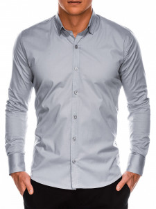 Класическа тънка риза със Slim fit кройка, класическа яка, дълъг ръкав и закопчаване отпред. Перфектна както за ежедневието, така и за по-официални случаи.