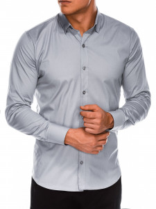 Класическа тънка риза със Slim fit кройка, класическа яка, дълъг ръкав и закопчаване отпред. Перфектна както за ежедневието, така и за по-официални случаи.