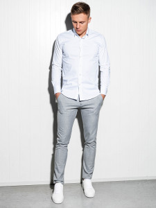 Класическа тънка риза със Slim fit кройка, класическа яка, дълъг ръкав и закопчаване отпред. Перфектна както за ежедневието, така и за по-официални случаи.