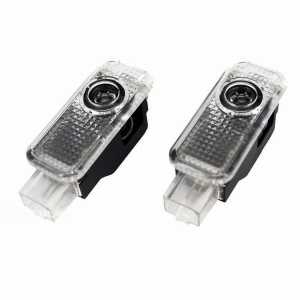 Set de două proiectoare LED pentru portiere Audi, compatibile cu înlocuirea lămpilor de curtoazie originale.
