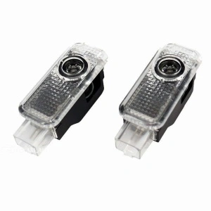 Set de două proiectoare LED pentru portiere Audi, compatibile cu înlocuirea lămpilor de curtoazie originale.