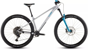 BICICLETA CUBE REACTION TM ONE RAWMETAL BLUE 2026